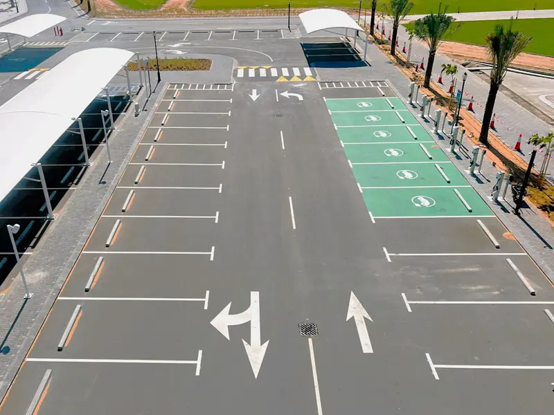 Road marking and traffic signage layout for parking and roadway guidance completed by Osool AlRoyah General Contracting in the UAE